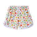 Children's polyester shorts in various colours and prints for beach holidays.