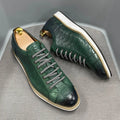 Men's handmade low-top shoes with embossed pattern detail and front laces.