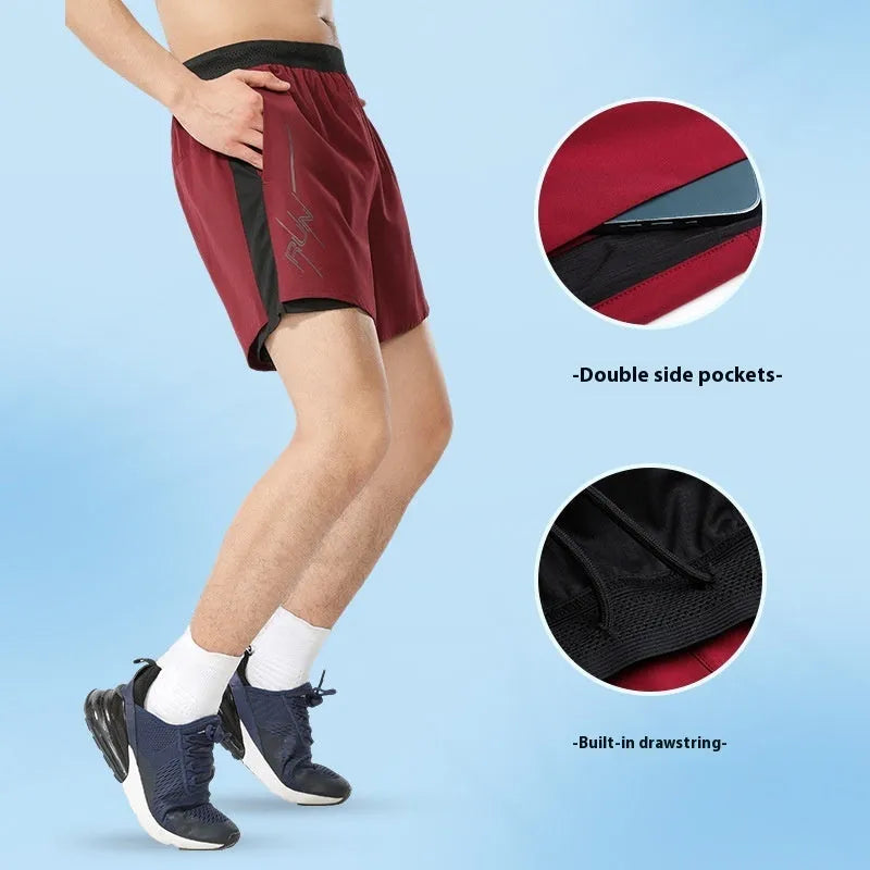 Men's black polyester basketball shorts with low-waist elasticated waistband laid flat