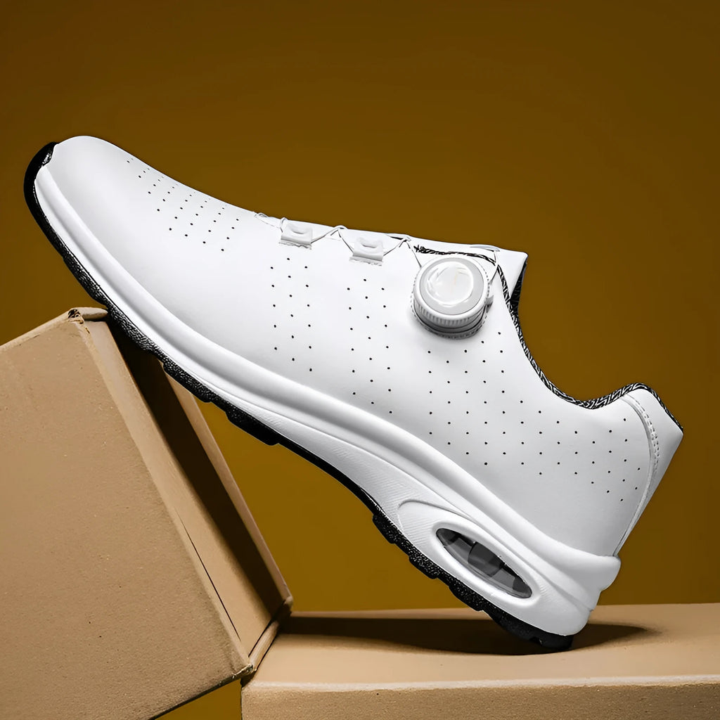Men's black and white low-top casual tennis shoes with mesh uppers and composite soles