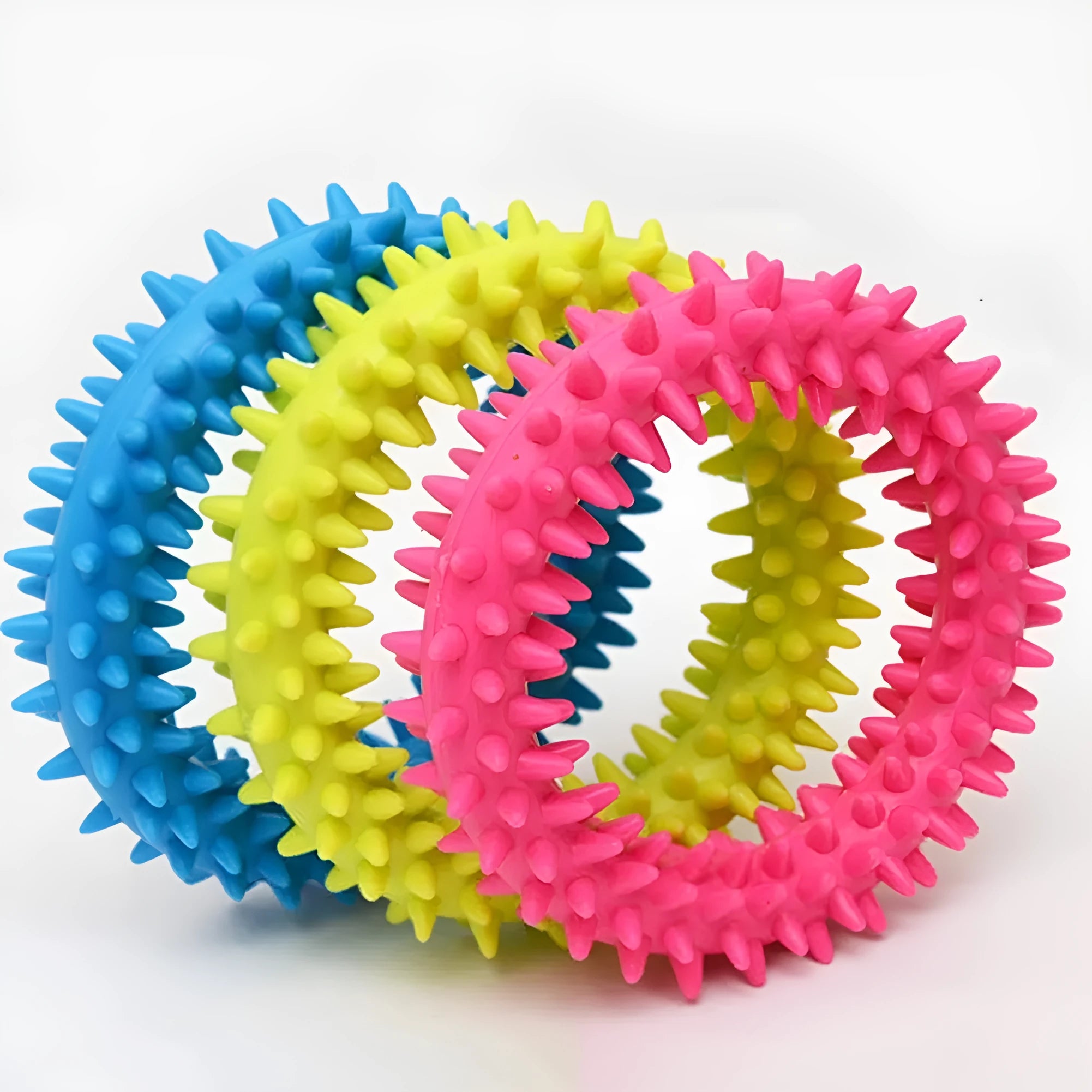 Blue TPR spiky circle ring dog chew toy for dental cleaning on a white background.