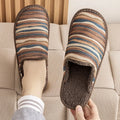 Cotton household slippers with linen surface and PVC sole in floral colour patterns
