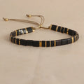Geometric glass pull bead bracelet in milky white, black, green, blue or red with round decorative elements