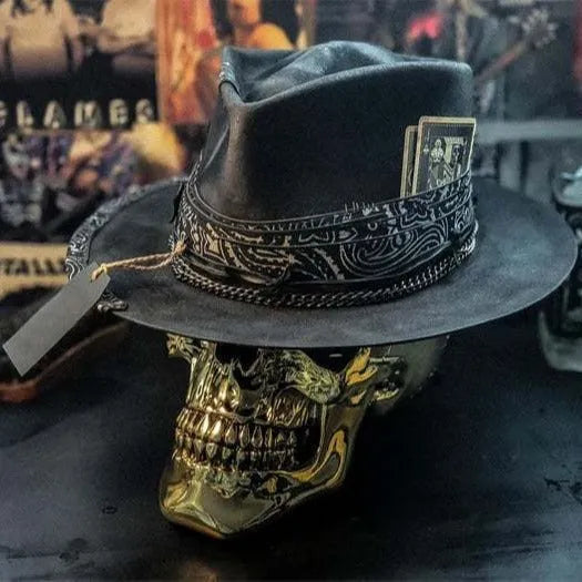 Handmade wool felt conical hat with skull design and denim-style crown