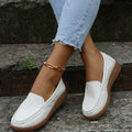 Women's PU leather flat loafers in multiple colours with round toe and car suture detail.