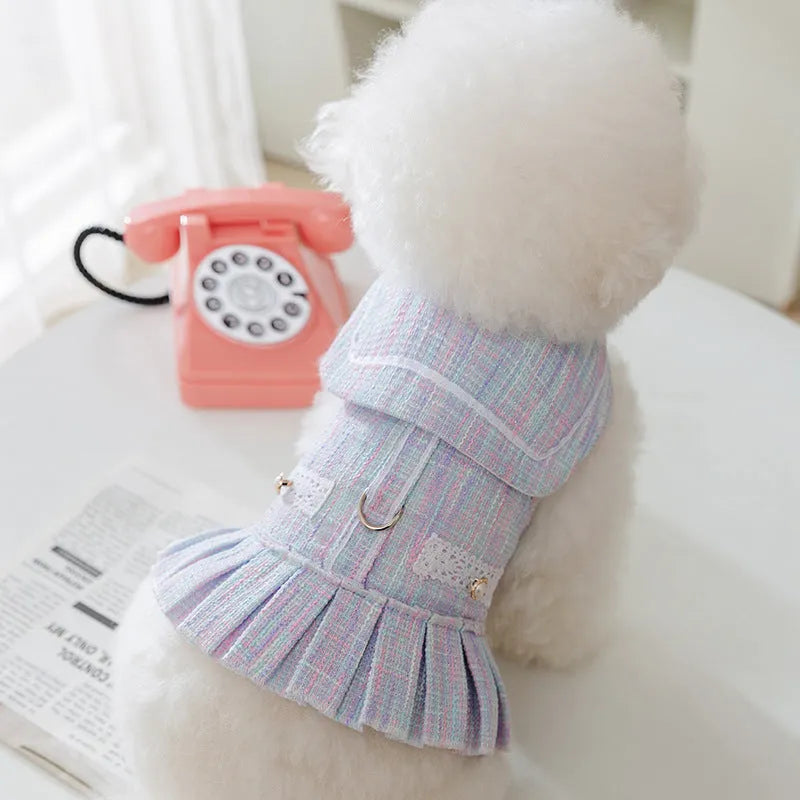 Pink and purple pet clothing garment for a cat or small dog on a white background.