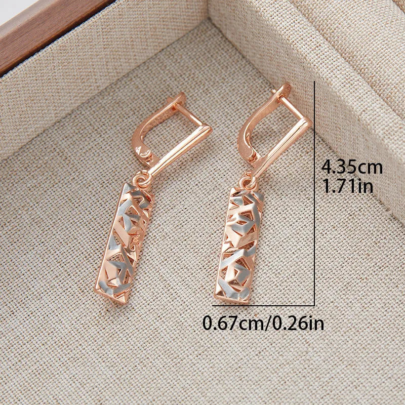 Rectangular two-tone hollow geometric alloy stud earrings for women with electroplated finish.