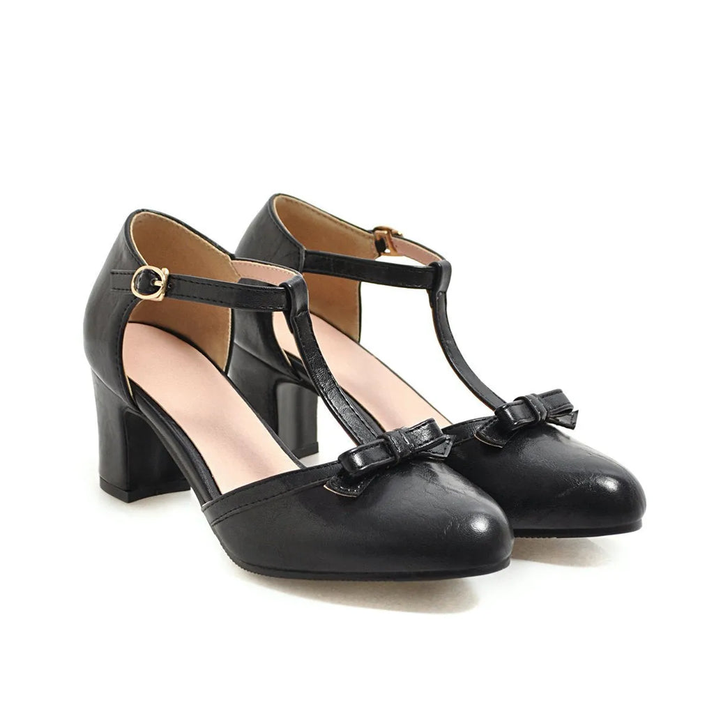 Women's chunky heel sandals with adjustable buckle strap and bow detail