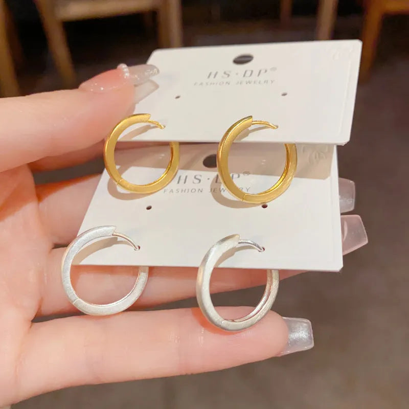 Geometric circle ear clips in gold or silver gold-plated copper for women