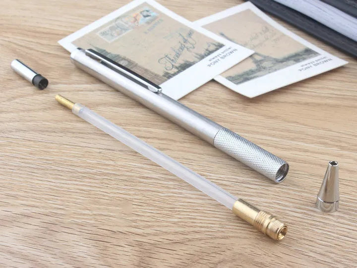 Metal automatic mechanical pencil with five lead size options displayed with 2B refills