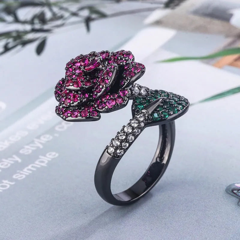 Geometric black gold personality ring with red corundum stones