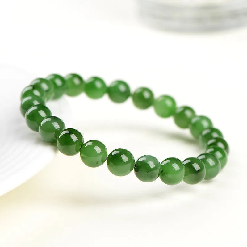 Natural Jasper Hetian jade bead bracelet in various sizes on a white background.