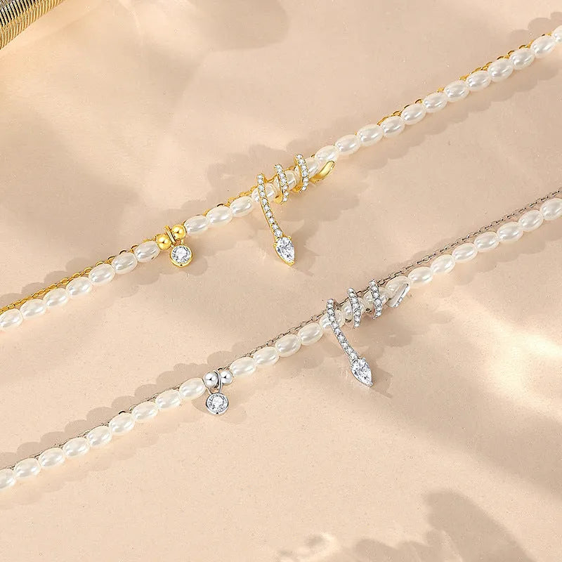 Pearl snake classic style bracelet in 925 silver with gold or white gold plating, featuring zodiac snake and geometric design