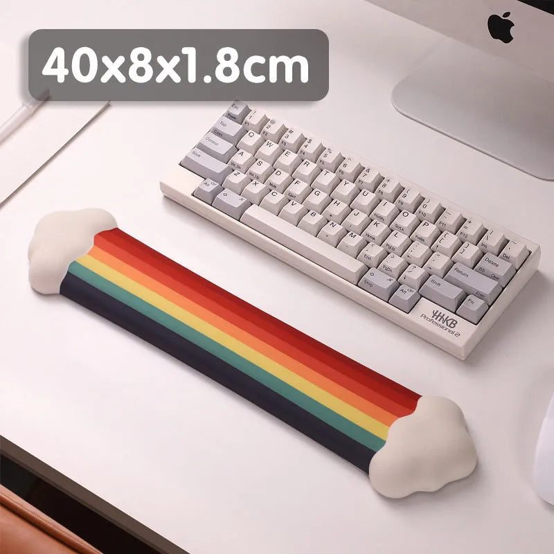 Silicone wrist rest mouse pad and matching keyboard support with cloud pattern design on desk