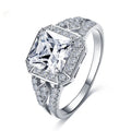 Geometric zircon ring with hollow design in platinum colour on copper, showing quadrilateral pattern and inlaid detailing