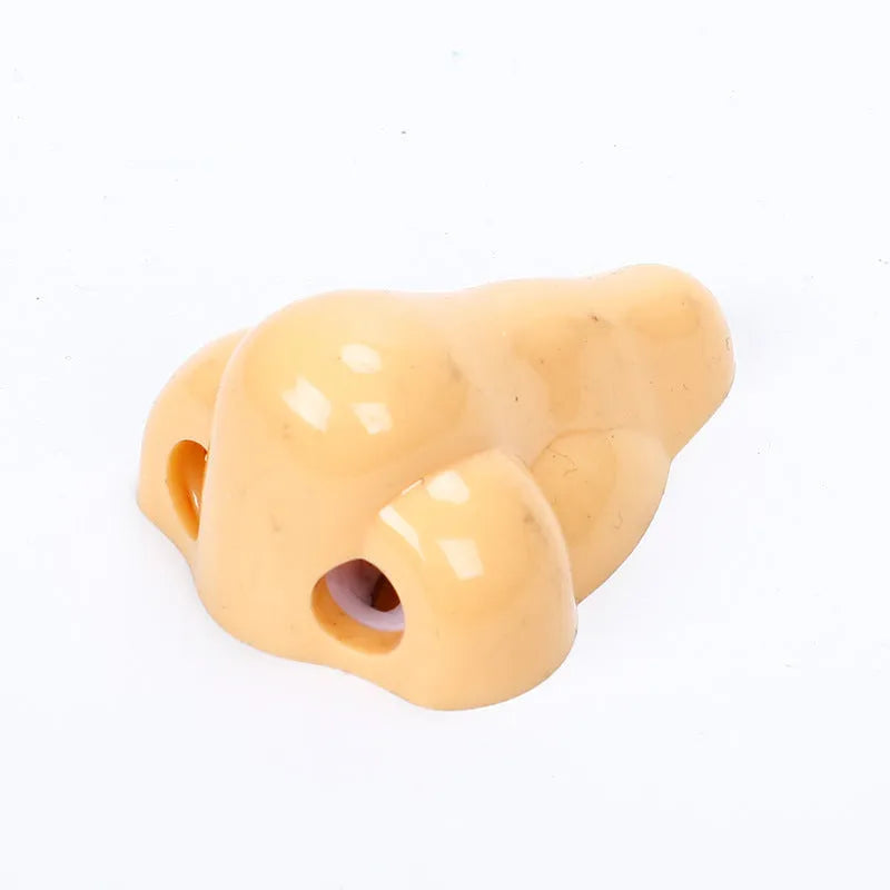 Geometry-shaped flesh colour plastic pencil sharpener with big nostril opening for standard pencils