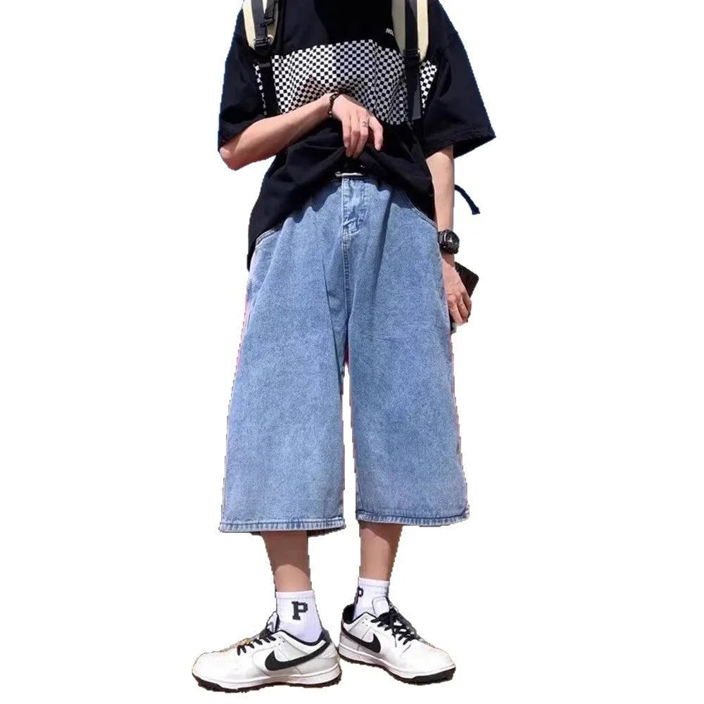 Blue washed denim men's pirate shorts with a high waist and straight legs on a white background.