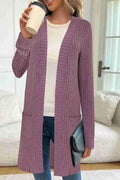 Long sleeve knitted cardigan jacket in black colour with loose pockets and regular sleeves