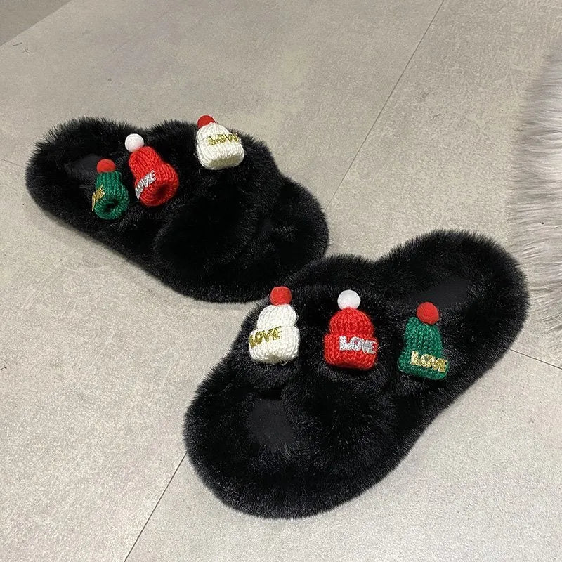 Black Christmas hat design women's slippers with faux plush upper and rubber sole.