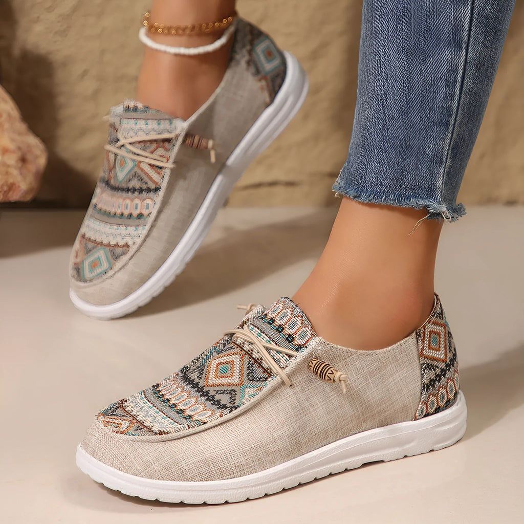 Women's flat round toe low-top shoe in artificial PU, available in black, dark grey, and khaki.