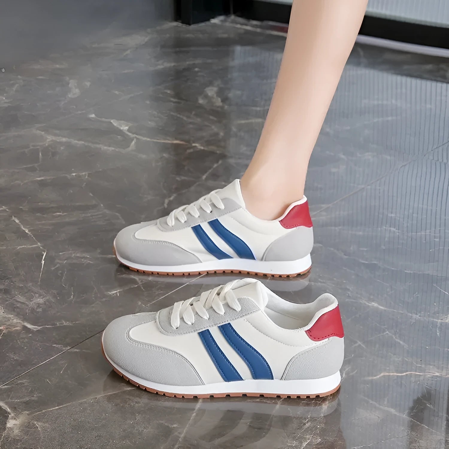 Blue and grey striped leisure sports shoes with round toe and flat rubber sole.