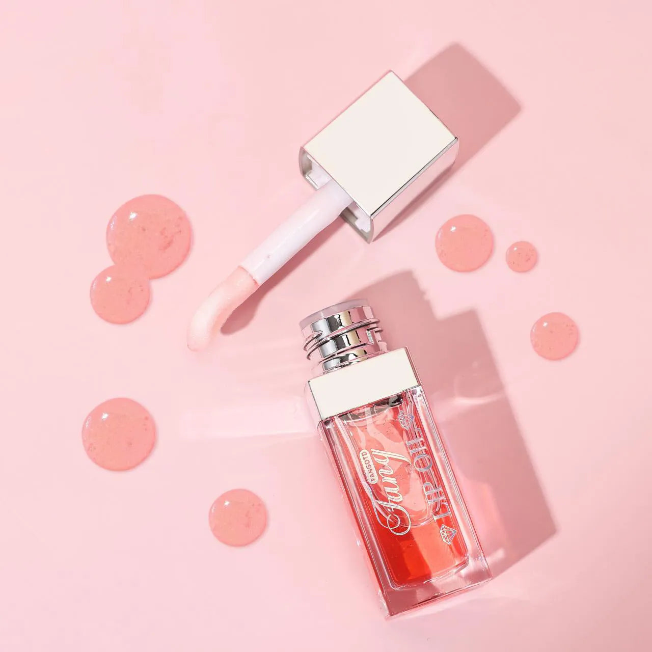 Mint lip gloss and lipstick set showing five bright colour options with lip essence oil