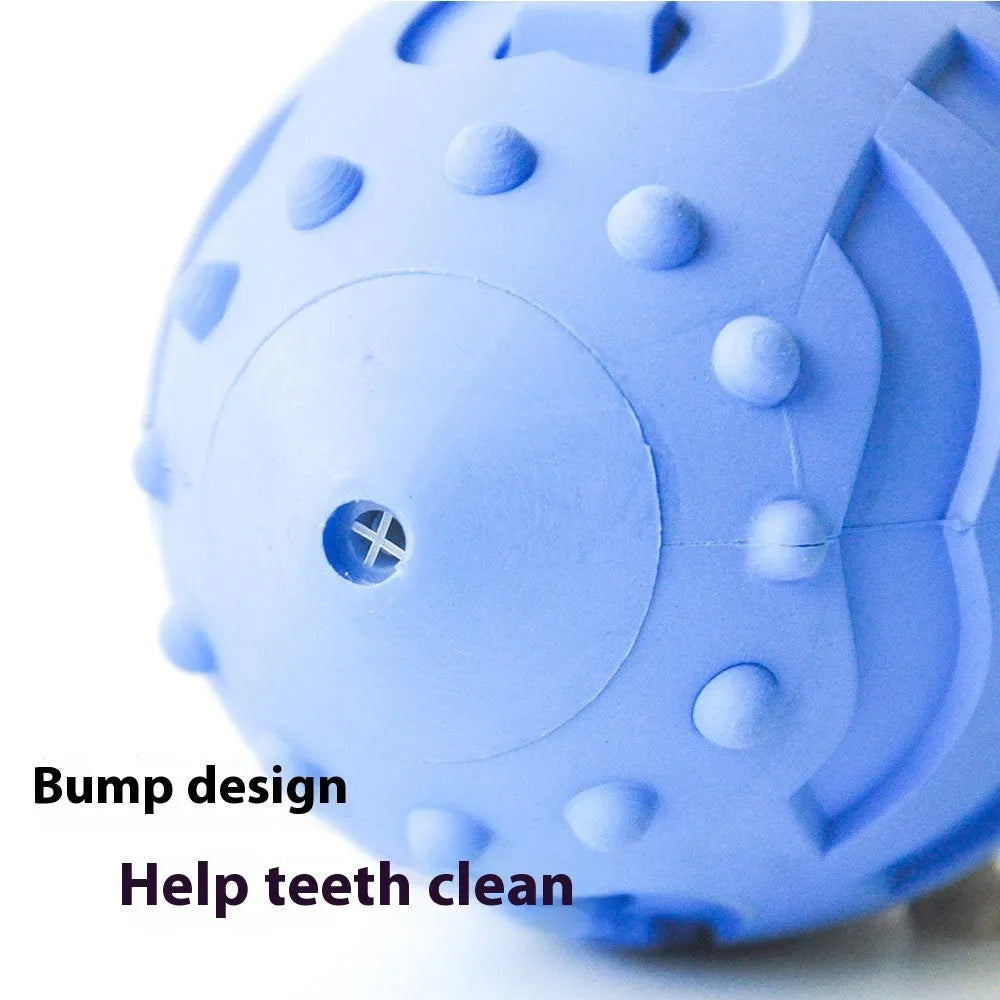Light green rubber rugby ball dog chew toy with textured surface for teeth cleaning