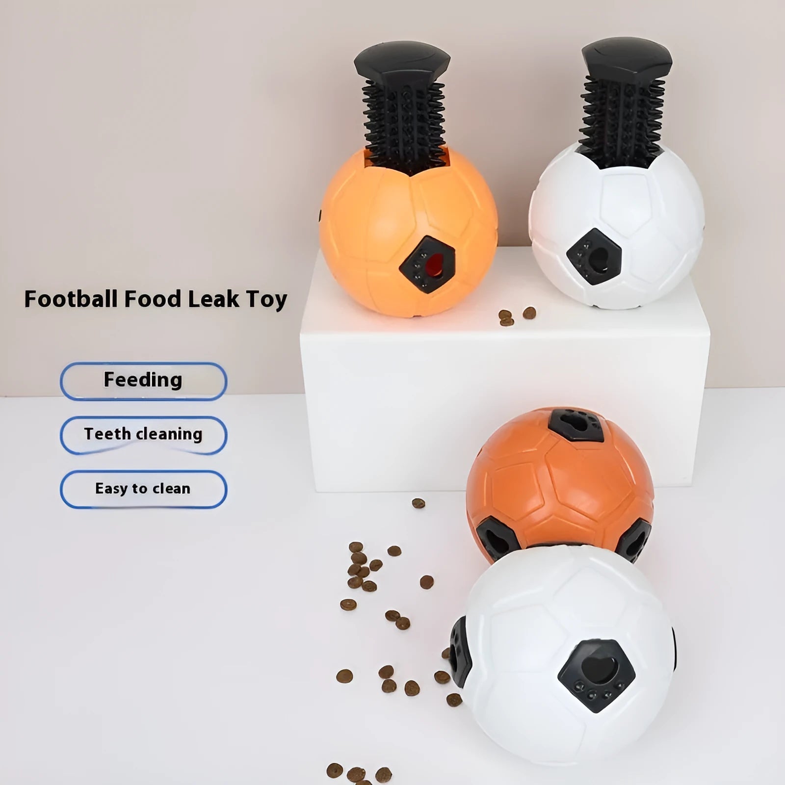 Orange and white TPR dog toy ball for chewing, showing hollow and tooth cleaning stick styles.
