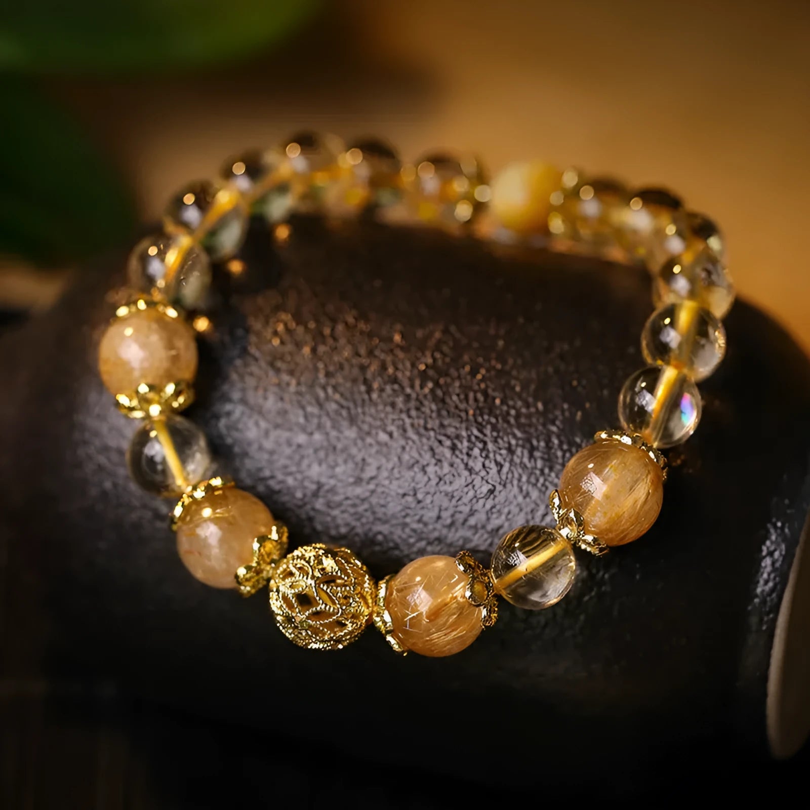 Retro style artificial crystal lucky bracelet for women in amethyst or yellow gold colour with electroplated finish.
