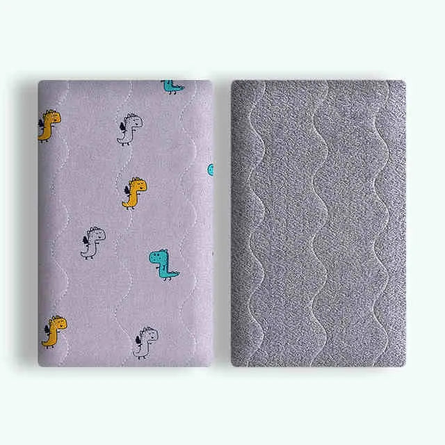 Double-sided cotton wool pet blanket in dinosaur pattern showing soft textured surface
