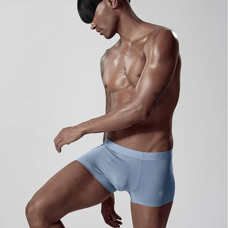 Seamless modal men's underwear in green colour showing mid-waist design