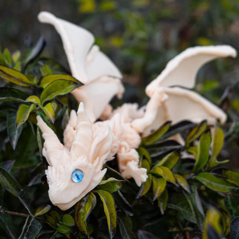 Red and gold printed dragon wings decorative toy made of PLA plastic.
