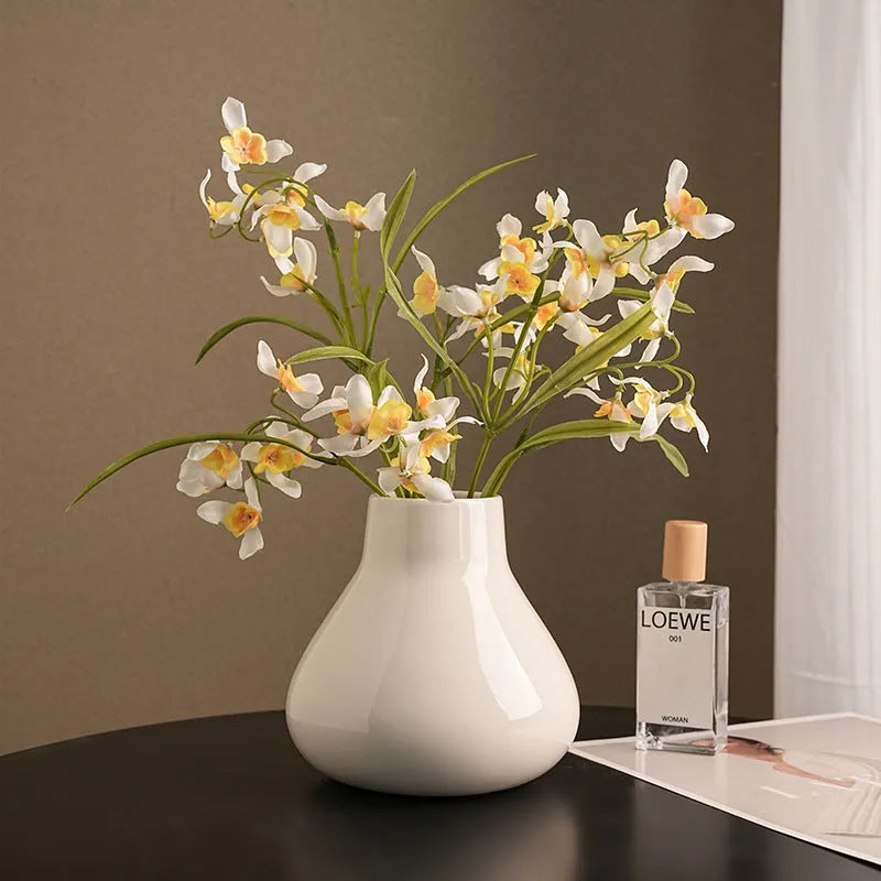 Ceramic round belly French vase with orchid flowers in black or white colour options