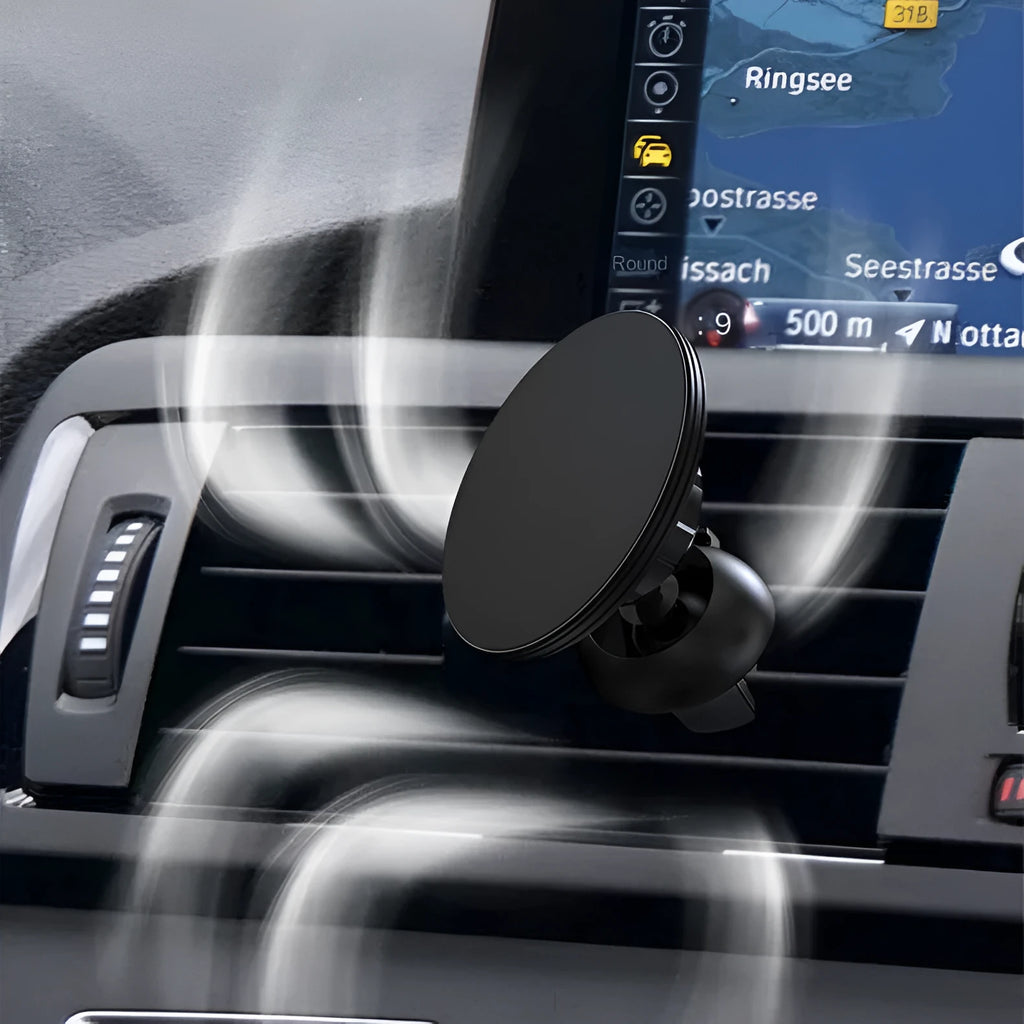 Black aluminium alloy magnetic car phone holder mounted on air vent, holding smartphone