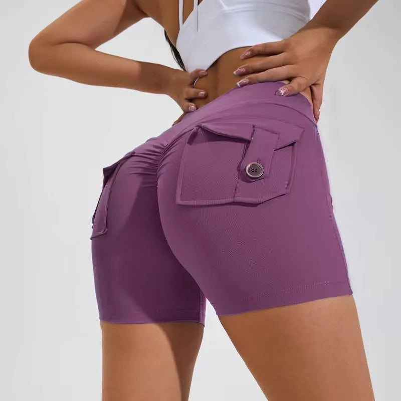 Women's high waist hip lifting shorts with pockets in various colours for fitness activities