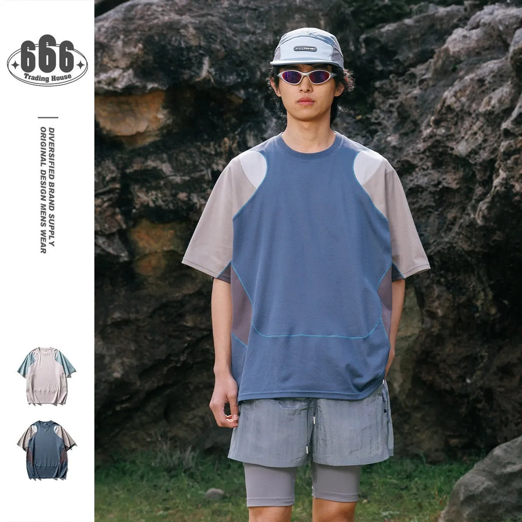 Men's loose blue sports t-shirt with patchwork contrast colour detail and raglan sleeves