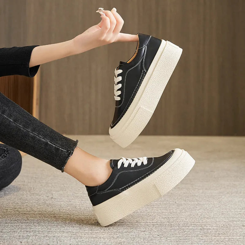 Women's black platform casual board shoes with embossed cowhide leather and round toe