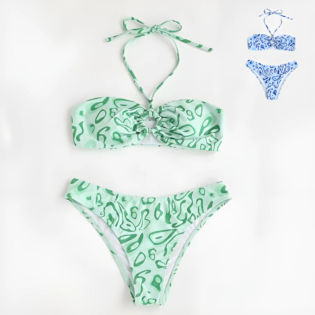Green floral bandeau bikini with split design and backless styling on swimwear model