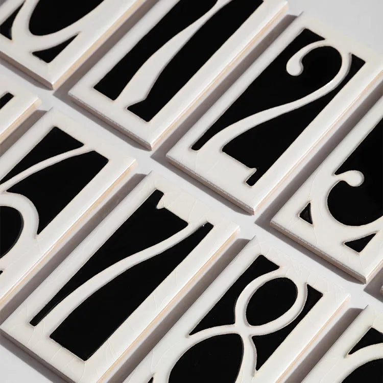 Handmade ceramic retro doorplate with enamel art finish showing house number design