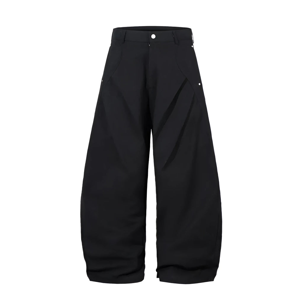 Men's black pleated casual trousers with a loose wide-leg fit and elasticated mid-waist.