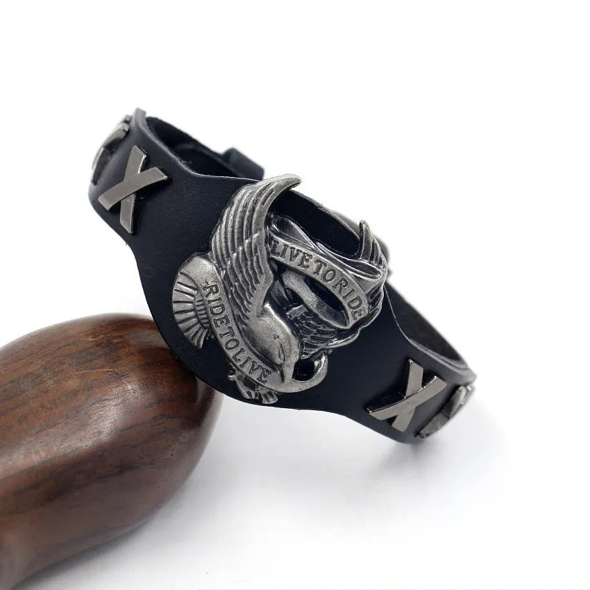 Black geometric leather bracelet with alloy eagle clasp showing width variation