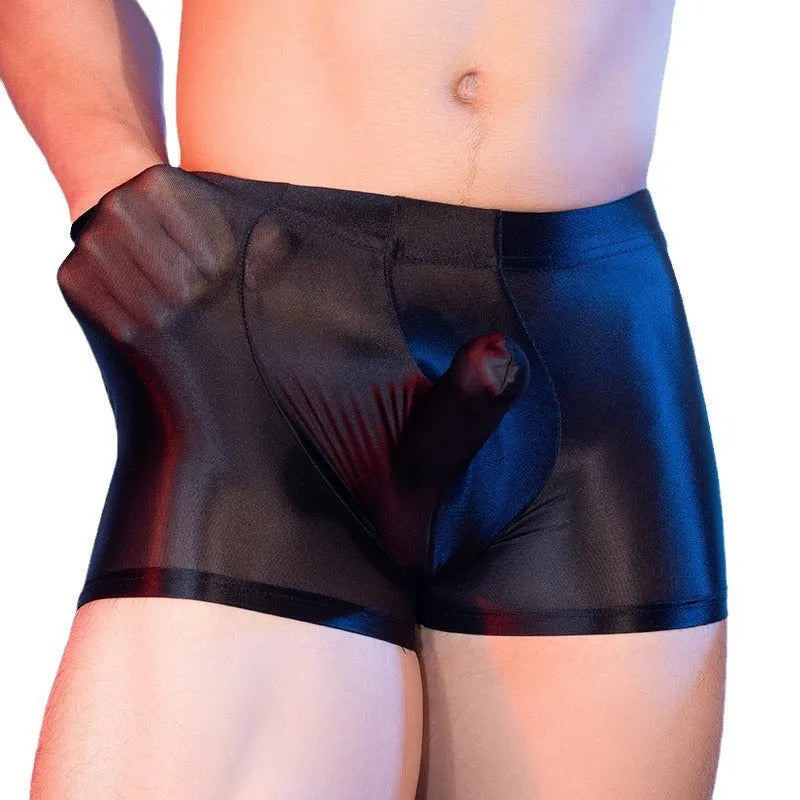 Red men's boxer shorts with elephant nose animal year design, showing mid-waist and seamless construction.