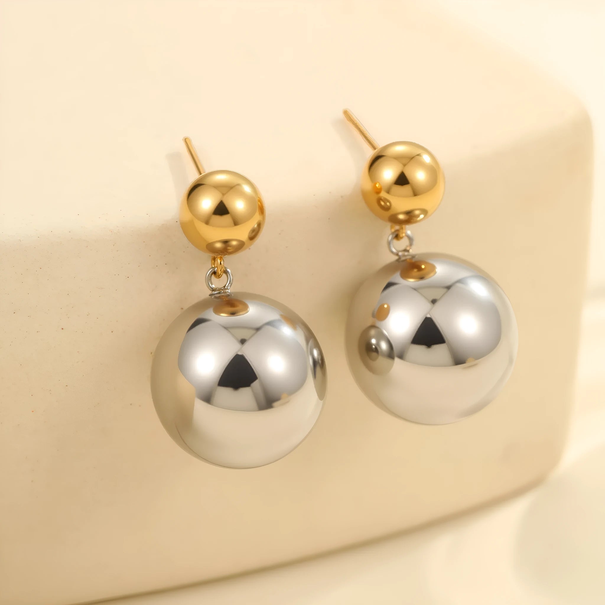 Stainless steel geometric ear studs with colour-block round beads and electroplated finish