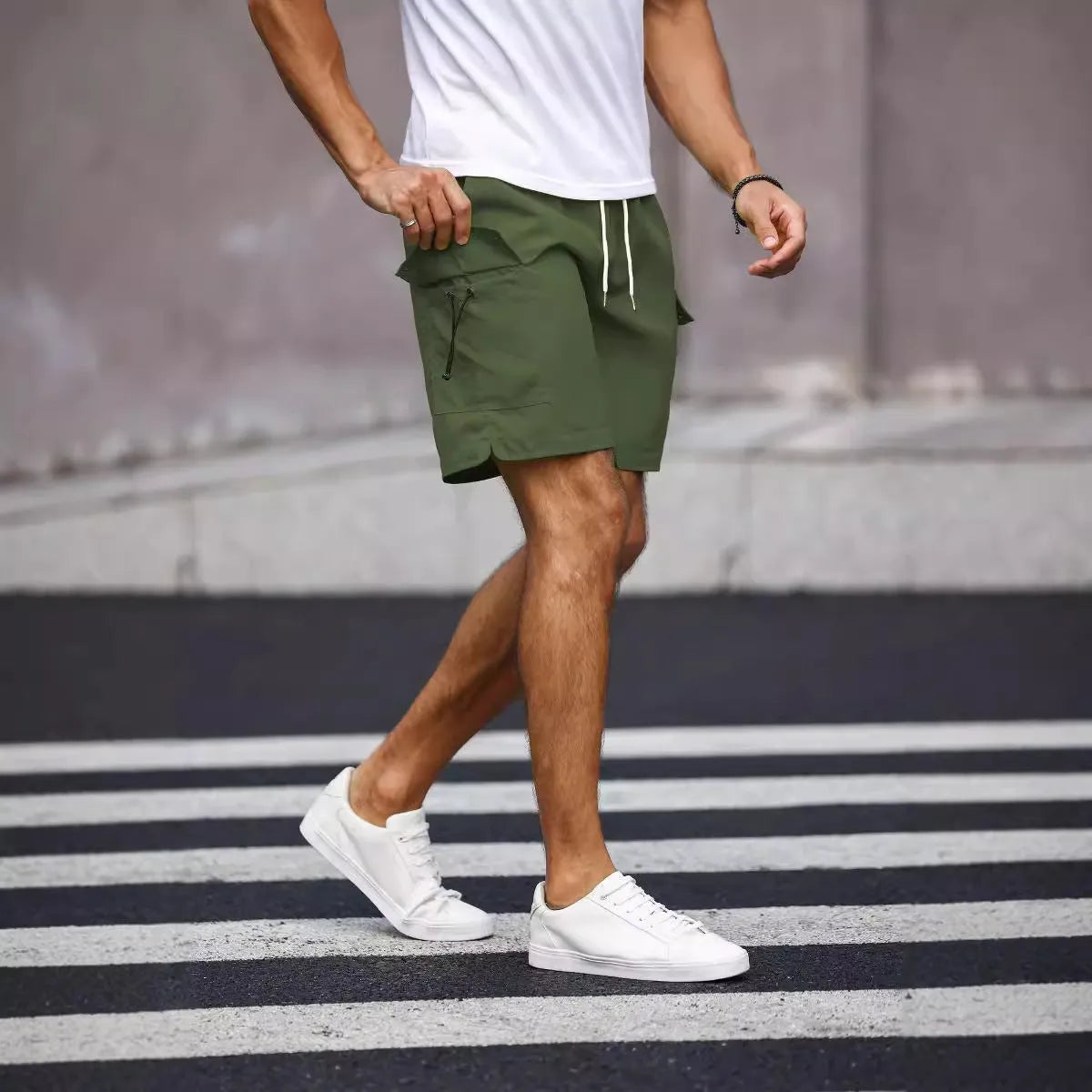 Men's loose fit street style work shorts in fluorescent green and army green colours.