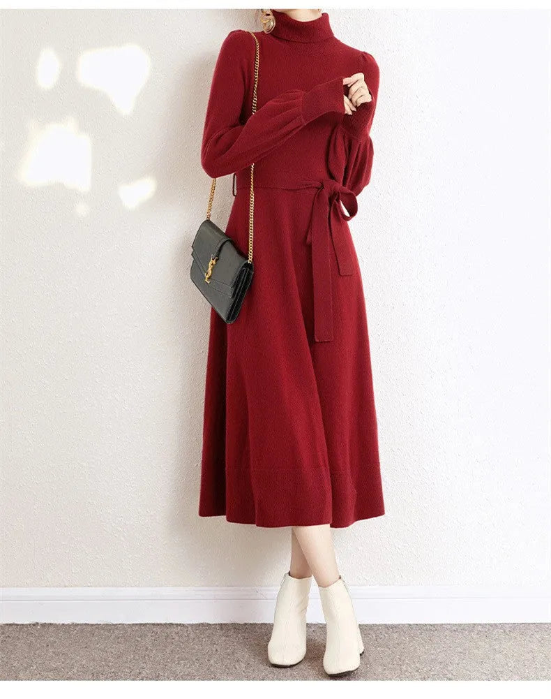 Turtleneck knitwear dress with elastic waist and loose big hem in polyester fabric