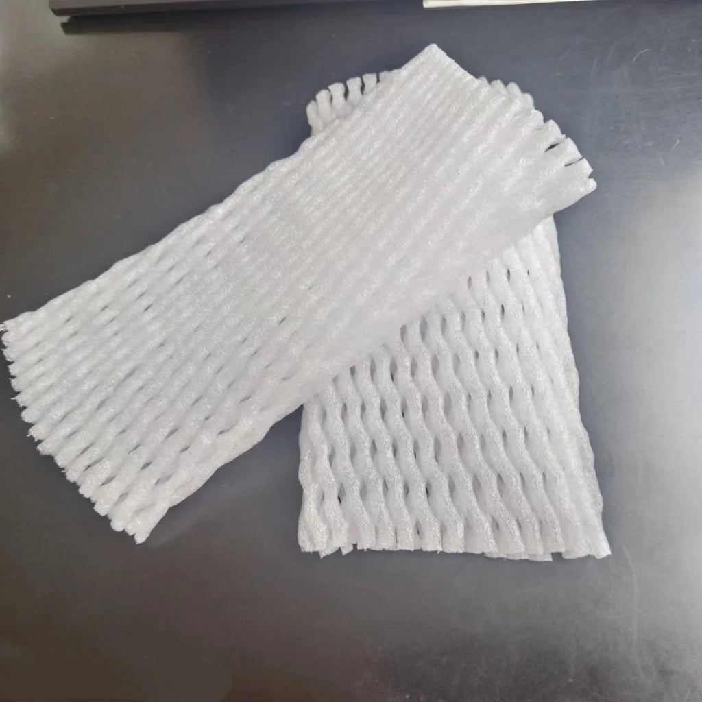 White foam net covers for fruit protection in multiple sizes on various fruits