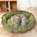 Grey reversible donut cat bed shown in both its donut shape and flipped over to its flat pad side.