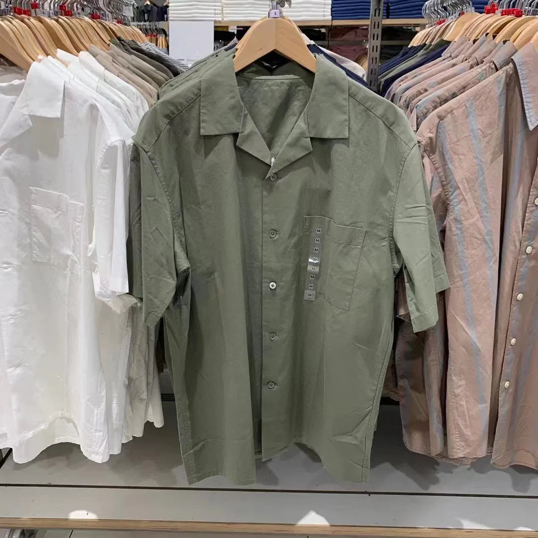 Men's beige modal cotton open collar casual shirt with regular sleeves on a hanger.