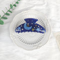 Oversized women's barrette with blue star moon starry sky pattern on a cellulose acetate clip.