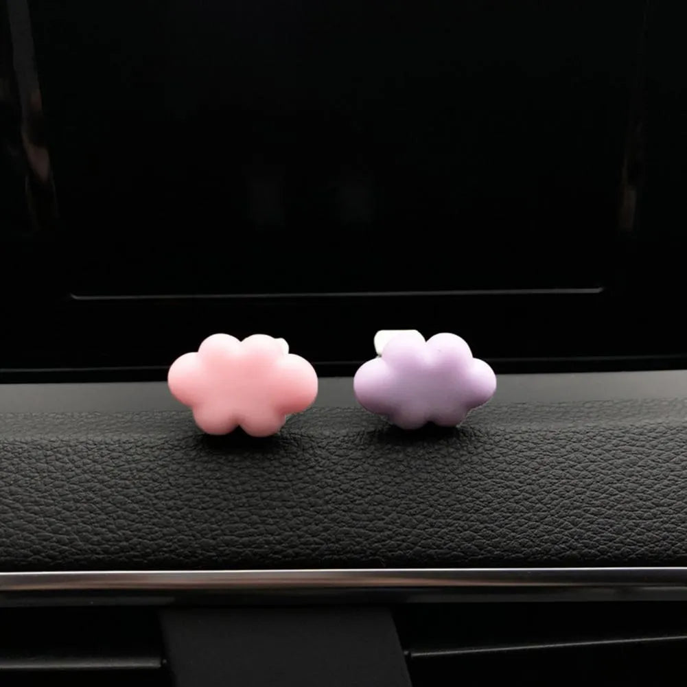 Resin car fragrance clip in pastel colours with cartoon cloud design for vent mounting